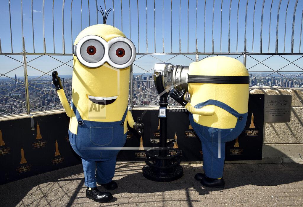 Evan Agostini Minion characters Kevin, left, and Bob pose on the 86th floor observatory deck at the Empire State Building to celebrate the upcoming film "Minions: The Rise of Gru" on Tuesday, June 28, 2022, in New York. (Photo by Evan Agostini/Invision/AP)