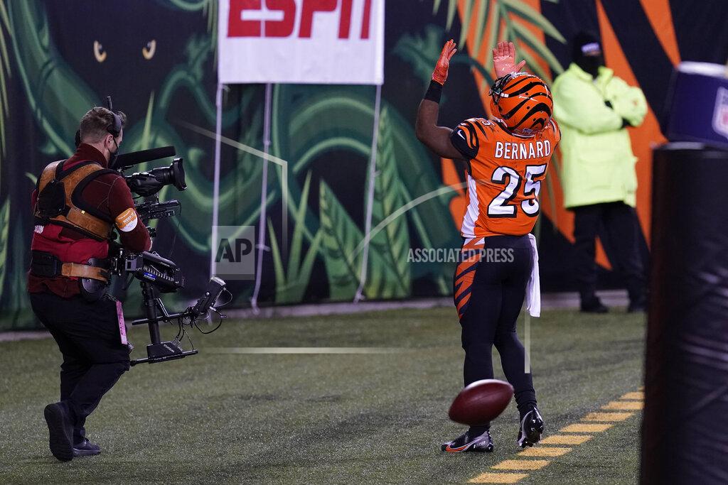 Michael Conroy Cincinnati Bengals' Giovani Bernard (25) celebrates a touchdown reception during the first half of an NFL football game against the Pittsburgh Steelers, Monday, Dec. 21, 2020, in Cincinnati. (AP Photo/Michael Conroy)
