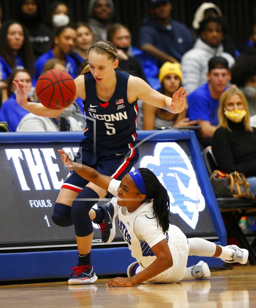 Noah K. Murray Seton Hall guard Mya Jackson (5) loses the ball out of bounds against Connecticut guard Paige Bueckers (5) during the second half of an NCAA college basketball game on Friday, Dec. 3, 2021, in South Orange, N.J. (AP Photo/Noah K. Murray)