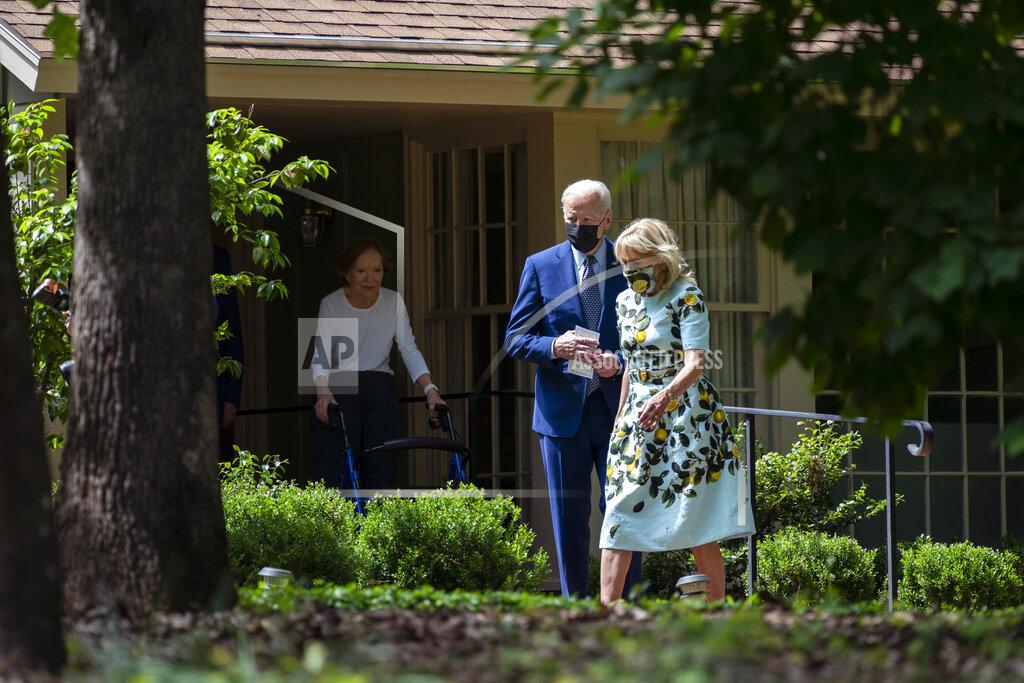 Evan Vucci Former first lady Rosalynn Carter looks on as President Joe Biden and first lady Jill Biden leave the home of former President Jimmy Carter during a trip to mark Biden’s 100th day in office, Thursday, April 29, 2021, in Plains, Ga. (AP Photo/Evan Vucci)