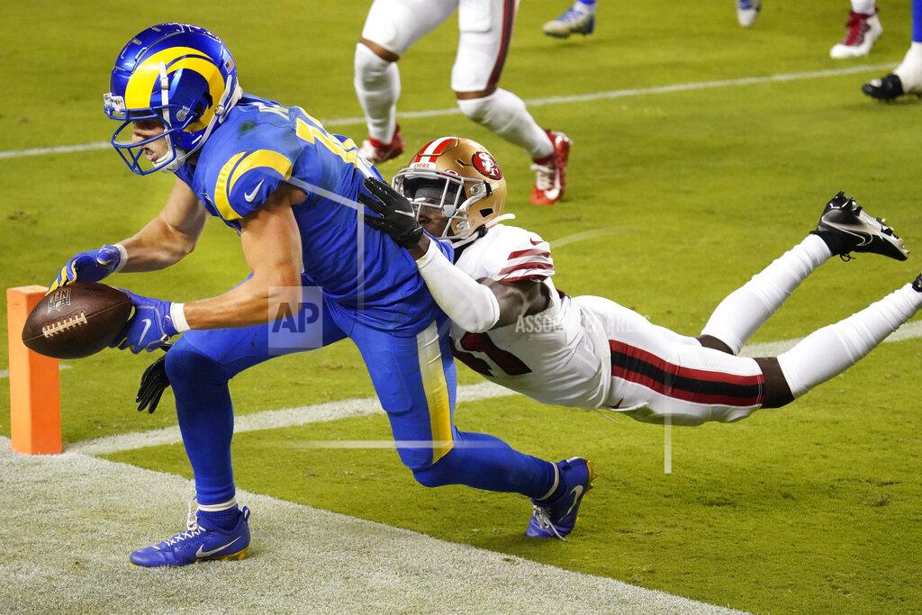 Tony Avelar Los Angeles Rams wide receiver Cooper Kupp, left, cannot catch a pass in the end zone in front of San Francisco 49ers cornerback Emmanuel Moseley during the second half of an NFL football game in Santa Clara, Calif., Sunday, Oct. 18, 2020. (AP Photo/Tony Avelar)