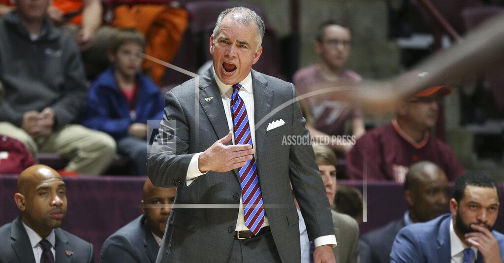 Matt Gentry Virginia Tech head coach Mike Young encourages his team in the first half of an NCAA college basketball game against Maryland-Eastern Shore in Blacksburg, Va., Sunday, Dec. 29 2019. (Matt Gentry/The Roanoke Times via AP)