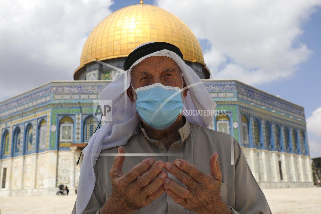 Mahmoud Illean A Palestinian man prays at the Dome of the Rock Mosque in the Al Aqsa Mosque during Friday prayers before a protest celebrating the six Palestinian prisoners who recently tunneled out of the Gilboa Prison, in the Old City of Jerusalem, Friday, Sept. 10, 2021. (AP Photo/Mahmoud Illean)