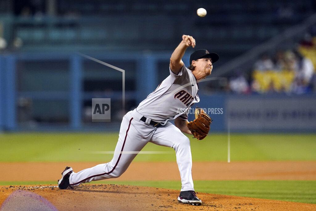 Marcio Jose Sanchez Arizona Diamondbacks starting pitcher Luke Weaver throws to a Los Angeles Dodgers batter during the first inning of a baseball game Tuesday, Sept. 14, 2021, in Los Angeles. (AP Photo/Marcio Jose Sanchez)