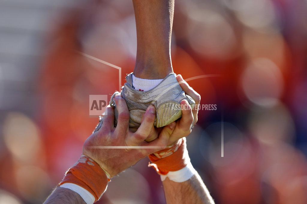 Richard Shiro Clemson cheerleaders perform during the first half of an NCAA college football game against Louisville Saturday, Nov. 3, 2018, in Clemson, S.C. (AP Photo/Richard Shiro)