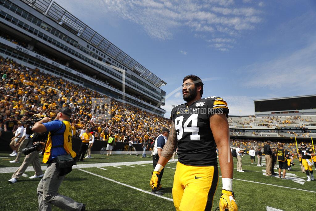 Matthew Putney Iowa defensive end A.J. Epenesa walks off the field following the Hawkeyes 30-0 win over Rutgers in an NCAA college football game, Saturday, Sept. 7, 2019, in Iowa City. (AP Photo/Matthew Putney)