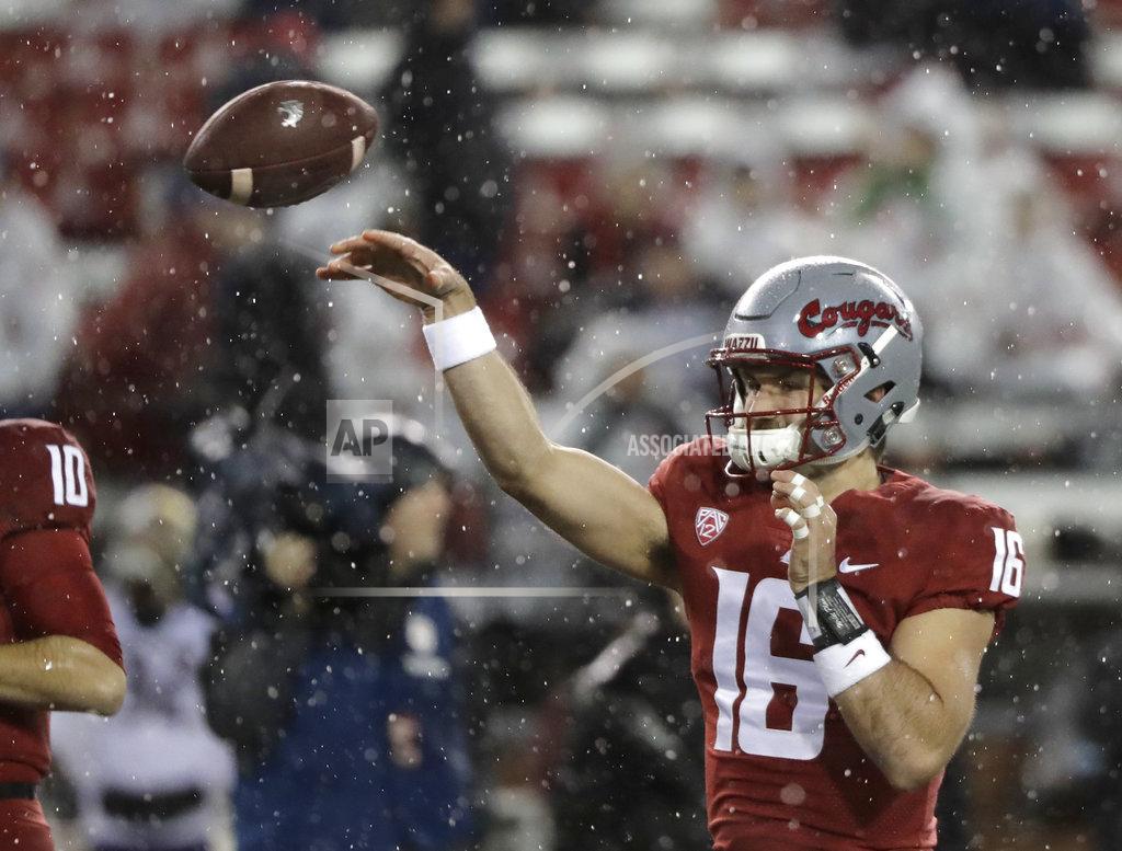 Ted S. Warren Washington State quarterback Gardner Minshew throws during warmups before an NCAA college football game against Washington, Friday, Nov. 23, 2018, in Pullman, Wash. (AP Photo/Ted S. Warren)