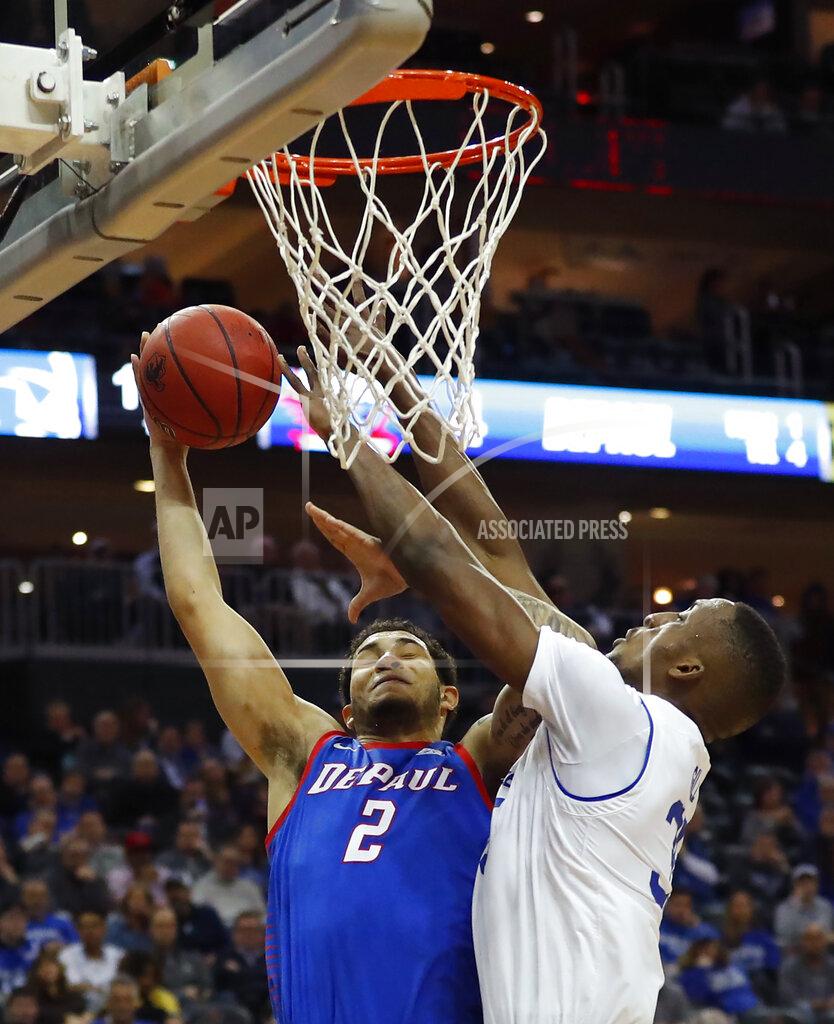 Noah K. Murray Seton Hall's Romaro Gill, right, defends against DePaul's Jaylen Butz (2) during the first half of an NCAA college basketball game Wednesday, Jan. 29, 2020 in Newark, N.J. (AP Photo/Noah K. Murray)