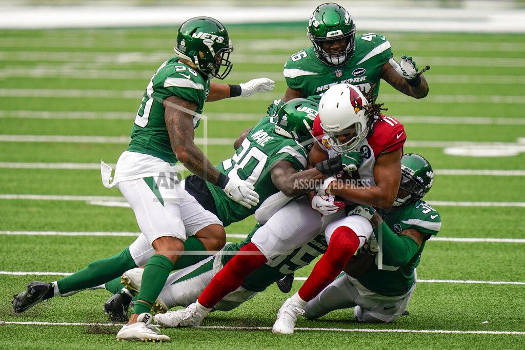 Seth Wenig Arizona Cardinals wide receiver Larry Fitzgerald (11) is tackled by New York Jets free safety Marcus Maye (20) during the second half of an NFL football game, Sunday, Oct. 11, 2020, in East Rutherford. (AP Photo/Seth Wenig)