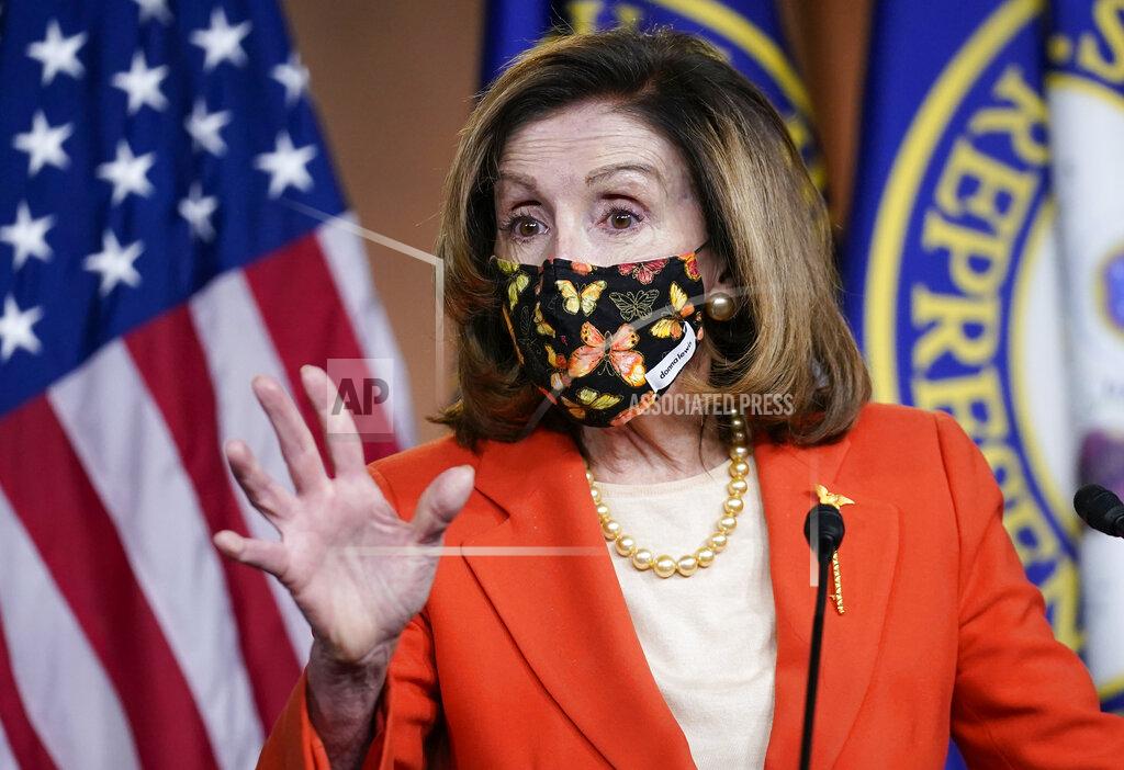 J. Scott Applewhite Speaker of the House Nancy Pelosi, D-Calif., holds a news conference at the Capitol in Washington, Friday, Jan. 15, 2021. (AP Photo/J. Scott Applewhite)