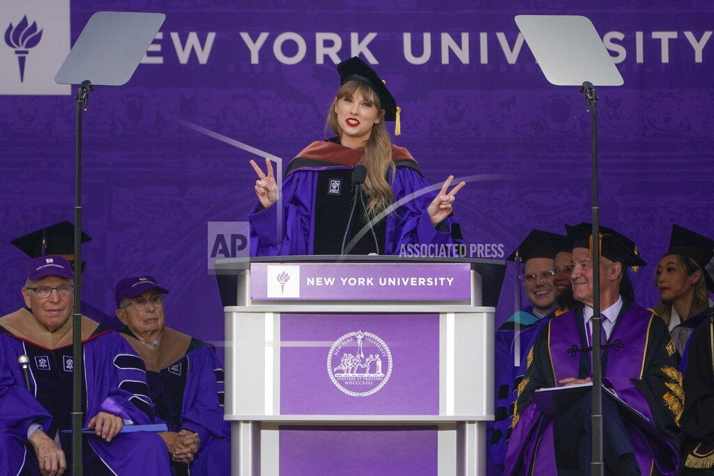 Seth Wenig Taylor Swift speaks during a graduation ceremony for New York University at Yankee Stadium in New York, Wednesday, May 18, 2022. (AP Photo/Seth Wenig)