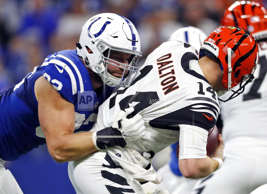Jeff Roberson FILE - In this Sept. 9, 2018, file photo, Indianapolis Colts defensive end Margus Hunt (92) sacks Cincinnati Bengals quarterback Andy Dalton (14) during the second half of an NFL football game in Indianapolis. Hunt has re-signed with the Colts, keeping him off the free-agent market, the team announced Tuesday, March 5, 2019. (AP Photo/Jeff Roberson, File)
