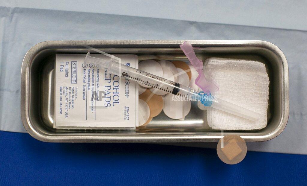 A syringe with the Moderna COVID-19 vaccine is shown at the Wilson County Health Department on Wednesday, Jan. 6, 2021 in Wilson, NC. (Robert Willett/The News & Observer via AP)