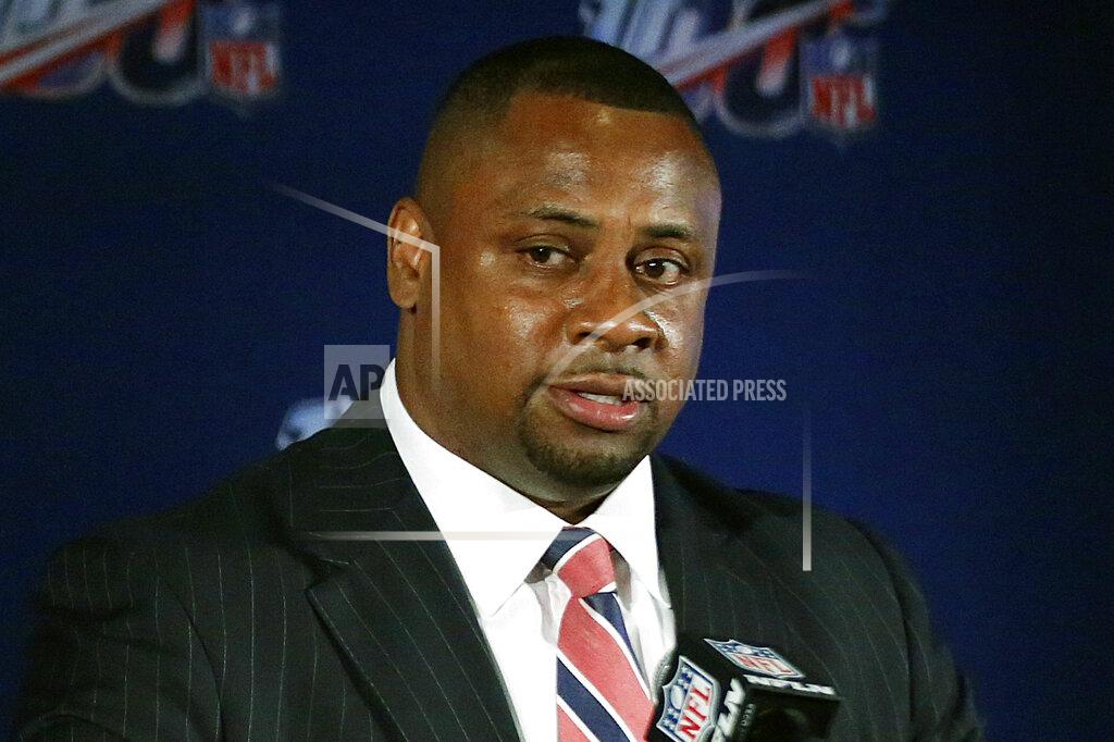 FILE - In this May 22, 2019, file photo, Troy Vincent, NFL executive vice president of football operations, speaks to the media during the owners meetings in Key Biscayne, Fla. Wisely, the NFL has taken baby steps toward some sort of normalcy. It has moved slowly in allowing a small number of team personnel to return to club facilities. (AP Photo/Brynn Anderson, File)