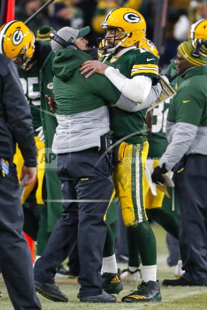 Matt Ludtke Green Bay Packers head coach Matt LaFleur celebrates a touchdown with Aaron Rodgers during the second half of an NFL divisional playoff football game against the Seattle Seahawks Sunday, Jan. 12, 2020, in Green Bay, Wis. (AP Photo/Matt Ludtke)