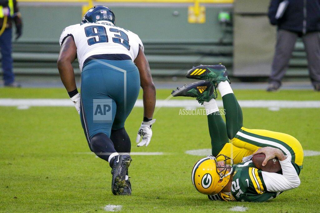 Mike Roemer Green Bay Packers' Aaron Rodgers is sacked by Philadelphia Eagles' Javon Hargrave during the first half of an NFL football game Sunday, Dec. 6, 2020, in Green Bay, Wis. (AP Photo/Mike Roemer)