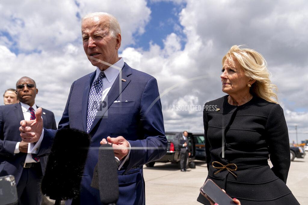 Andrew Harnik President Joe Biden, accompanied by first lady Jill Biden, speaks before boarding Air Force One at Buffalo-Niagara International Airport in Buffalo, N.Y., Tuesday, May 17, 2022, after paying their respects and speaking to families of the victims of Saturday's shooting at a supermarket. (AP Photo/Andrew Harnik)