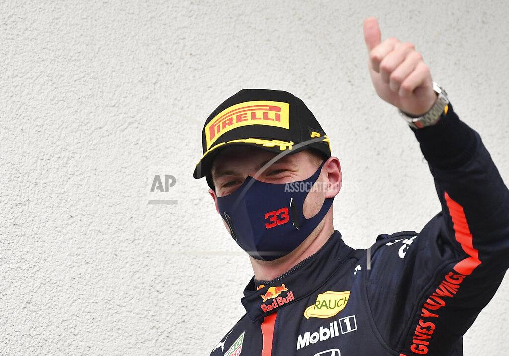Joe Klamar Second placed Red Bull driver Max Verstappen of the Netherlands celebrates after the Hungarian Formula One Grand Prix at the Hungaroring racetrack in Mogyorod, Hungary, Sunday, July 19, 2020. (Joe Klamar/Pool via AP)
