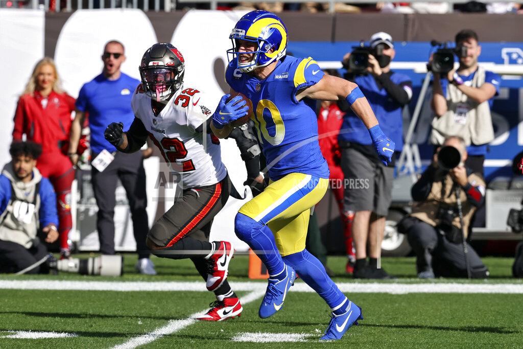 Mark Lomoglio Los Angeles Rams wide receiver Cooper Kupp (10) beats Tampa Bay Buccaneers safety Mike Edwards (32) on a 70-yard touchdown reception during the first half of an NFL divisional round playoff football game Sunday, Jan. 23, 2022, in Tampa, Fla. (AP Photo/Mark LoMoglio)