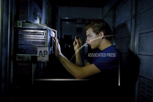 Vlad Cioplea This image released by Lionsgate shows Tye Sheridan in a scene from "Voyagers." (Lionsgate via AP)