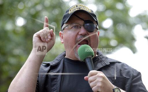 FILE - In this Sunday, June 25, 2017 file photo, Stewart Rhodes, founder of the Oath Keepers, speaks during a rally outside the White House in Washington. Rhodes has been arrested and charged with seditious conspiracy in the Jan. 6 attack on the U.S. Capitol. The Justice Department announced the charges against Rhodes on Thursday. (AP Photo/Susan Walsh, File)