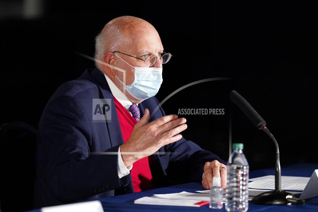 Darron Cummings Dr. Robert Redfield, Centers for Disease Control and Prevention Director, speaks during a round table discussion at Catalent Biologics, Tuesday, Dec. 15, 2020, in Bloomington, Ind. (AP Photo/Darron Cummings)