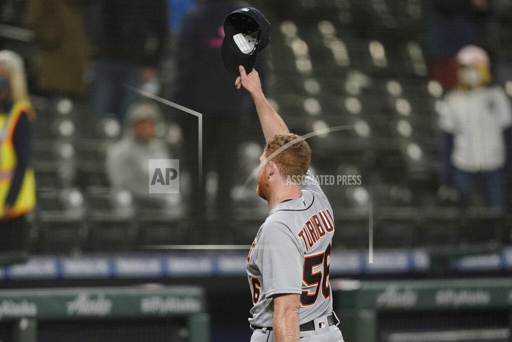 Ted S. Warren Detroit Tigers starting pitcher Spencer Turnbull tips his cap to the crowd after he threw a no-hitter baseball game against the Seattle Mariners, Tuesday, May 18, 2021, in Seattle. The Tigers won 5-0. (AP Photo/Ted S. Warren)