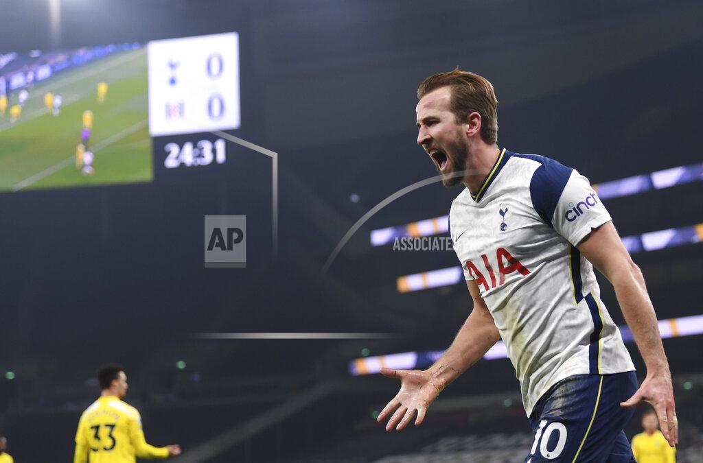 Shaun Botterill Tottenham's Harry Kane celebrates after scoring his side's opening goal during the English Premier League soccer match between Tottenham Hotspur and Fulham at the Tottenham Hotspur Stadium in London, Wednesday, Jan. 13, 2021. (Shaun Botterill/Pool via AP)