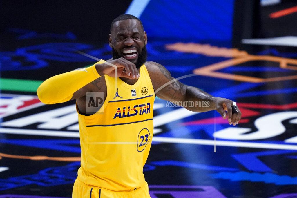 Brynn Anderson Los Angeles Lakers forward LeBron James smiles during the first half of basketball's NBA All-Star Game in Atlanta, Sunday, March 7, 2021. (AP Photo/Brynn Anderson)