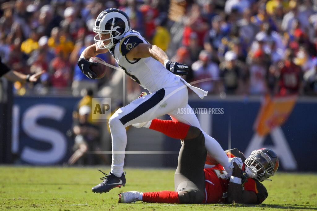 Los Angeles Rams wide receiver Cooper Kupp is tackled by Tampa Bay Buccaneers safety Mike Edwards during the second of an NFL football game Sunday, Sept. 29, 2019, in Los Angeles. (AP Photo/Mark J. Terrill)