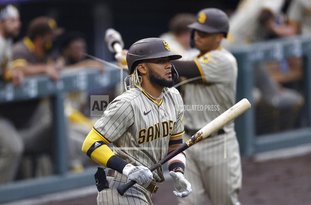 David Zalubowski San Diego Padres' Fernando Tatis Jr. heads to the plate to lead off the first inning of a baseball game against the Colorado Rockies Friday, July 31, 2020, in Denver. (AP Photo/David Zalubowski)