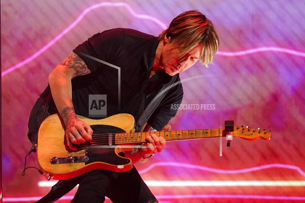 Mark Humphrey Keith Urban performs at the 56th annual Academy of Country Music Awards on Saturday, April 17, 2021, at the Grand Ole Opry in Nashville, Tenn. The awards show airs on April 18 with both live and prerecorded segments. (AP Photo/Mark Humphrey)