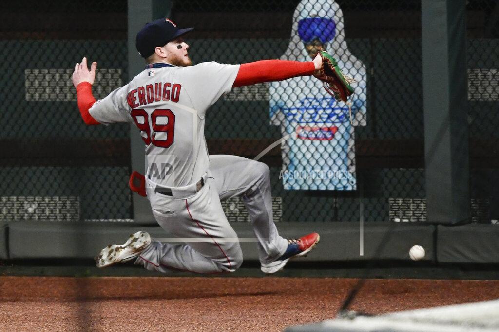 John Amis Boston Red Sox right fielder Alex Verdugo cannot catch a fly ball off the bat of Atlanta Braves' Adeiny Hechavarria during the eighth inning of a baseball game Friday, Sept. 25, 2020, in Atlanta. (AP Photo/John Amis)