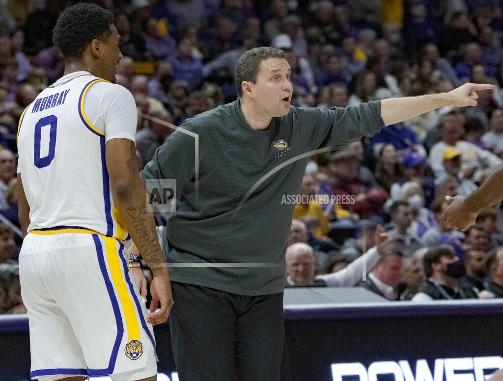 Matthew Hinton LSU head coach Will Wade, right, talks to LSU guard Brandon Murray (0) during the second half of an NCAA college basketball game against Tennessee in Baton Rouge, La., Saturday, Jan. 8, 2022. (AP Photo/Matthew Hinton)