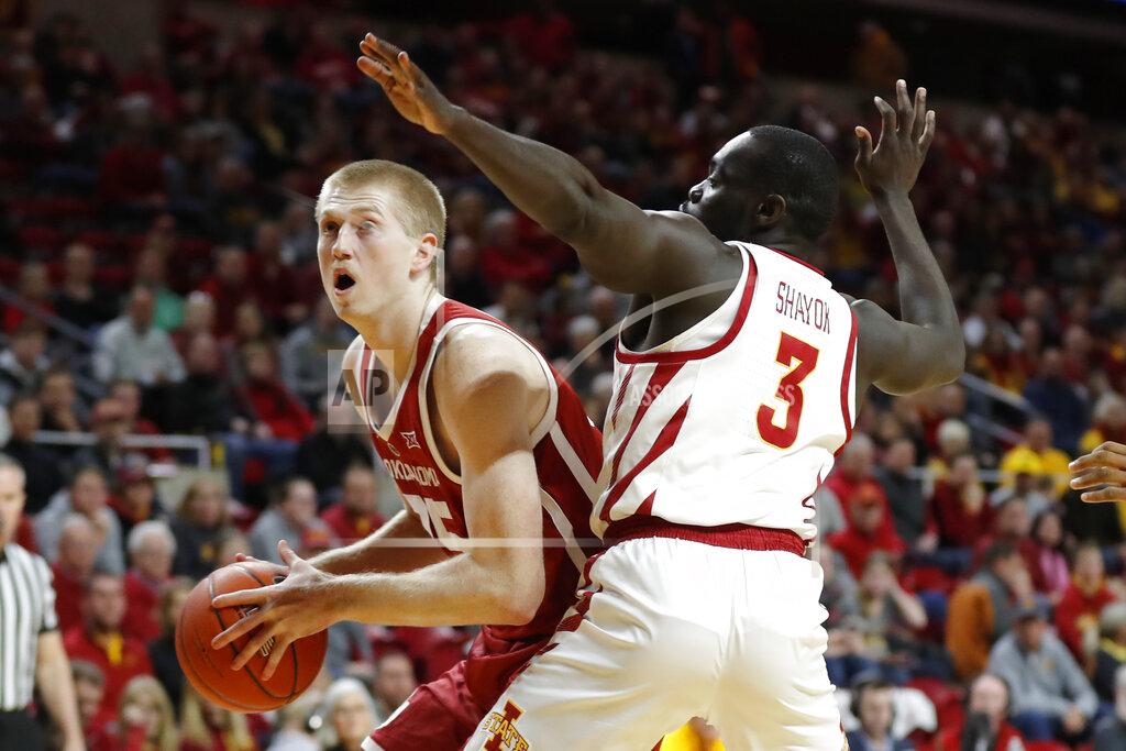 Charlie Neibergall Oklahoma forward Brady Manek drives past Iowa State guard Marial Shayok, right, during the first half of an NCAA college basketball game, Monday, Feb. 25, 2019, in Ames, Iowa. (AP Photo/Charlie Neibergall)