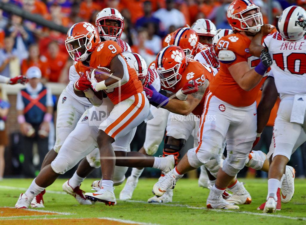 Richard Shiro Clemson's Travis Etienne rushes in for a touchdown during the second half of an NCAA college football game against North Carolina State Saturday, Oct. 20, 2018, in Clemson, S.C. (AP Photo/Richard Shiro)