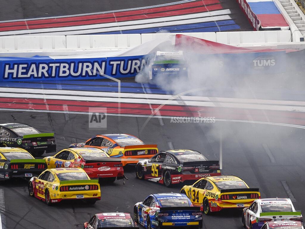 Mike Mccarn Chase Elliott (9) hits the wall in Turn 1 on a restart during a NASCAR Cup Series auto race at Charlotte Motor Speedway, Sunday, Sept. 29, 2019, in Concord, N.C. (AP Photo/Mike McCarn)