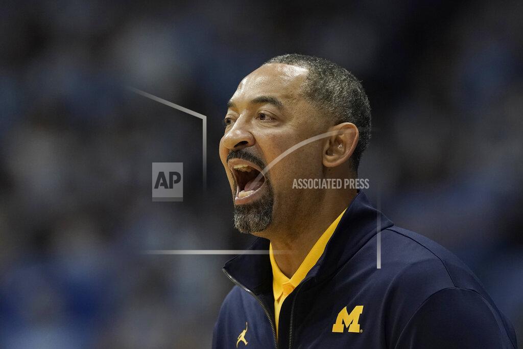 Gerry Broome Michigan head coach Juwan Howard yells during the second half of an NCAA college basketball game against North Carolina in Chapel Hill, N.C., Wednesday, Dec. 1, 2021. (AP Photo/Gerry Broome)