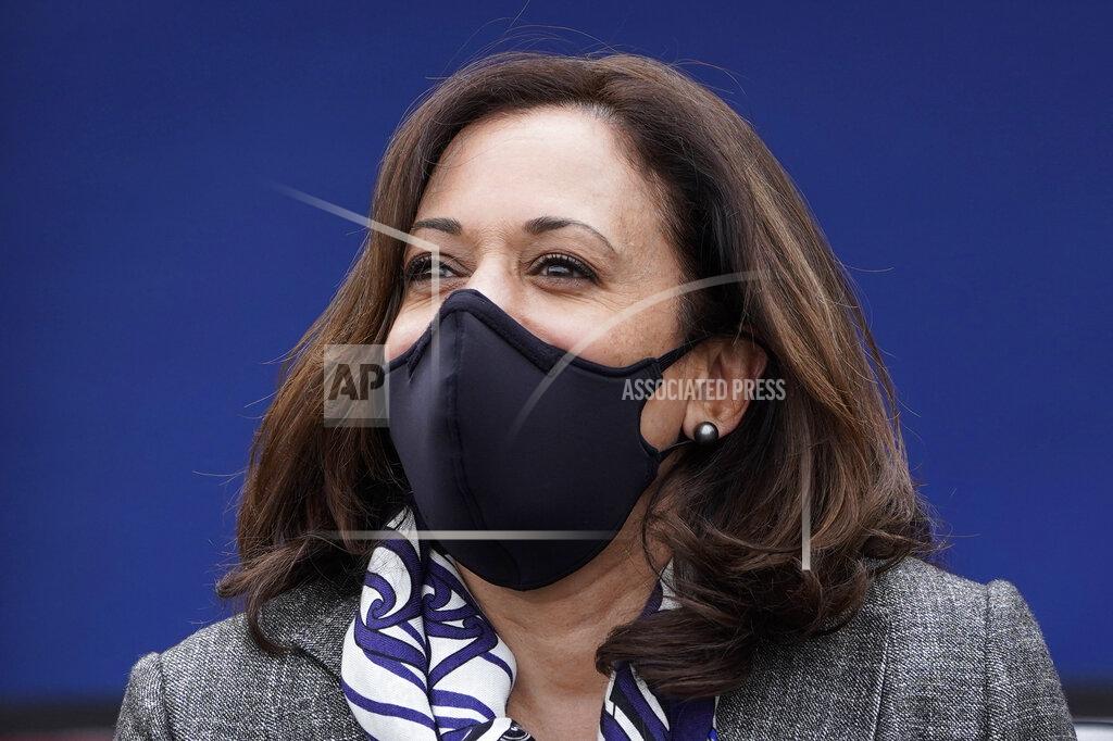 Paul Sancya Democratic vice presidential candidate Sen. Kamala Harris, D-Calif., listens at Headliners Barbershop in Detroit, Tuesday, Sept. 22, 2020. (AP Photo/Paul Sancya)