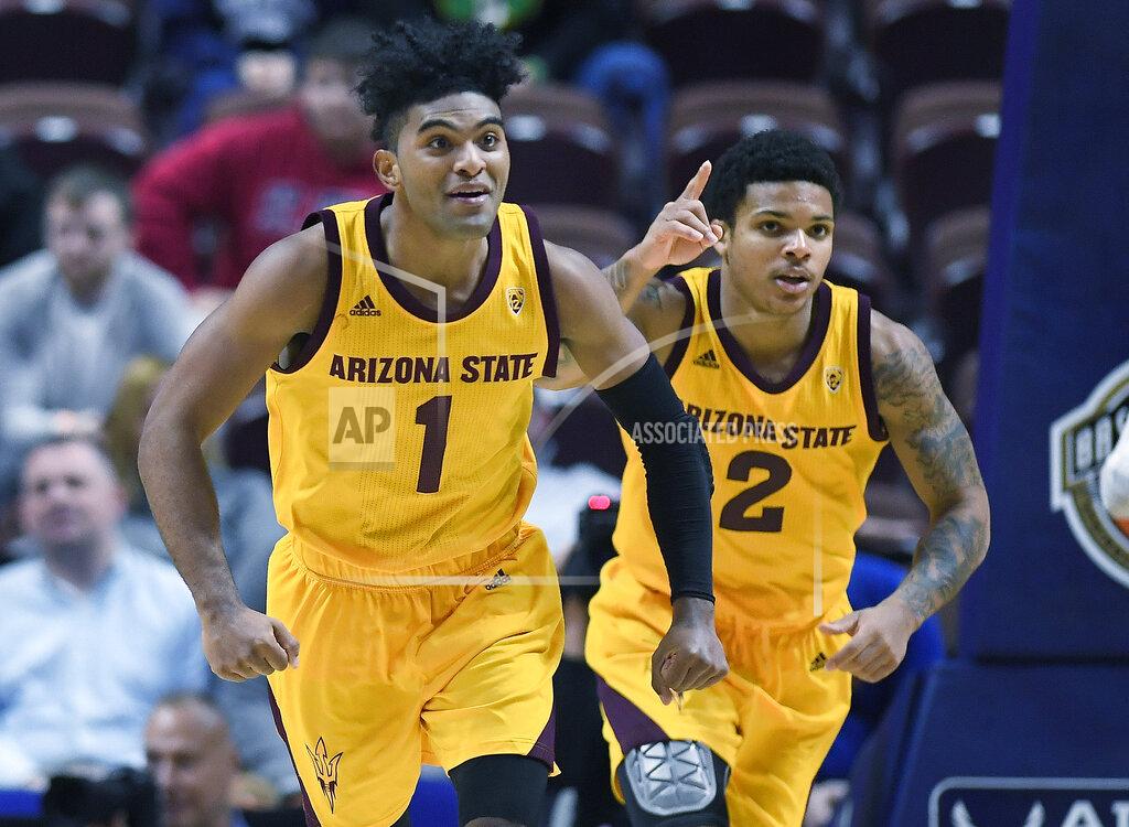 Jessica Hill Arizona State's Remy Martin, left, and Arizona State's Rob Edwards celebrate a basket during the second half of an NCAA college basketball game against St. John's, Saturday, Nov. 23, 2019, in Uncasville, Conn. (AP Photo/Jessica Hill)