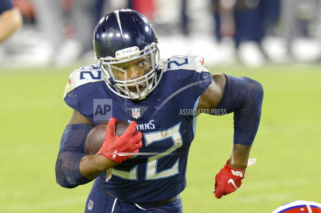 Mark Zaleski Tennessee Titans running back Derrick Henry (22) carries the ball against the Buffalo Bills in the second half of an NFL football game Tuesday, Oct. 13, 2020, in Nashville, Tenn. (AP Photo/Mark Zaleski)