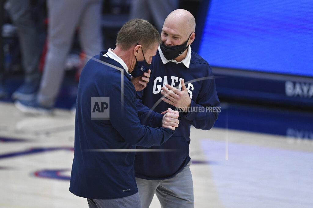 Jose Carlos Fajardo Gonzaga coach Mark Few, left, greets Saint Mary's coach Randy Bennett before an NCAA college basketball game in Moraga, Calif., Saturday, Jan. 16, 2021. (Jose Carlos Fajardo/Bay Area News Group via AP)