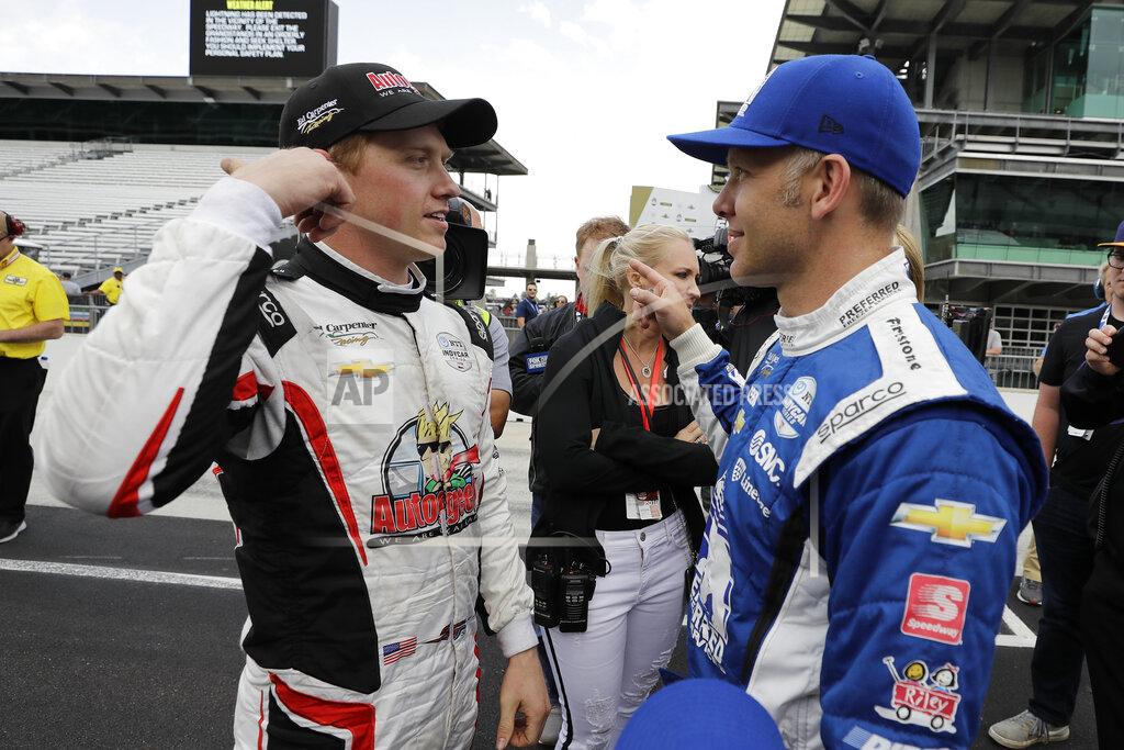 Darron Cummings Spencer Pigot, left, talks with Ed Carpenter after qualifications for the Indianapolis 500 IndyCar auto race at Indianapolis Motor Speedway, Sunday, May 19, 2019 in Indianapolis. (AP Photo/Darron Cummings)