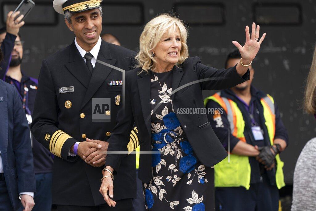 Jacquelyn Martin First lady Jill Biden, right, with U.S. Surgeon General Dr. Vivek Murthy, waves to FedEx employees during an event about the baby formula shortage Wednesday, May 25, 2022, in Chantilly, Va., at Dulles International Airport. (AP Photo/Jacquelyn Martin)