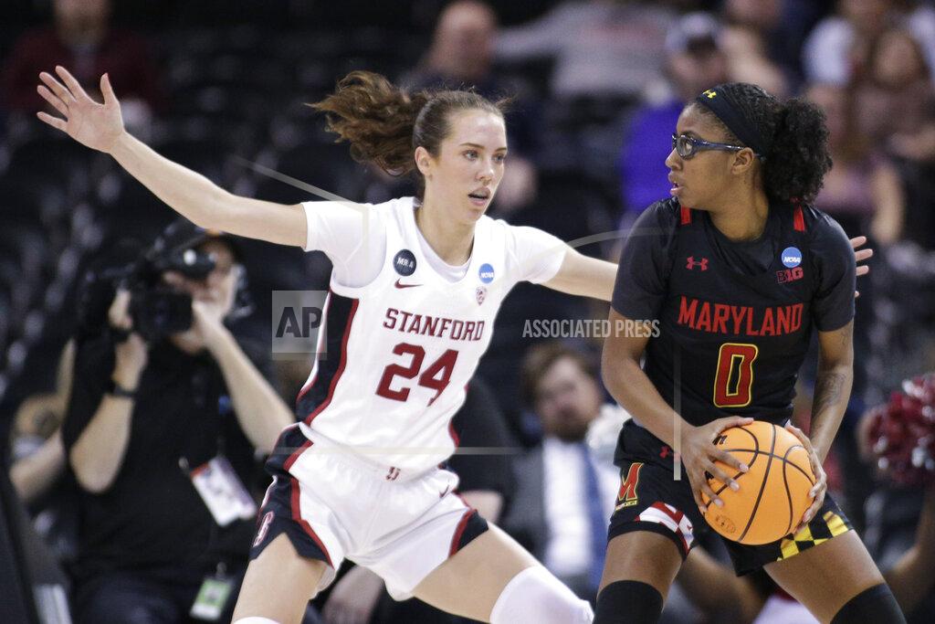 Young Kwak Maryland guard Shyanne Sellers (0) tries to get around the defense of Stanford guard Lacie Hull (24) during the first half of a college basketball game in the Sweet 16 round of the NCAA tournament, Friday, March 25, 2022, in Spokane, Wash. (AP Photo/Young Kwak)