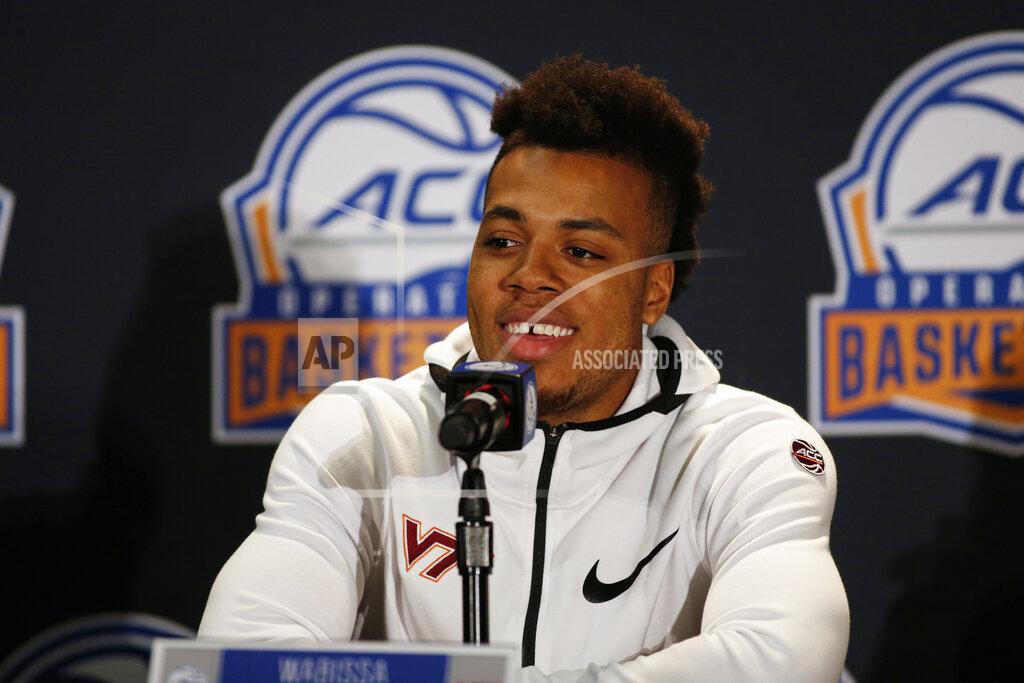Nell Redmond Virginia Tech player Wabissa Bede answers a question during the Atlantic Coast Conference NCAA college basketball media day in Charlotte, N.C., Tuesday, Oct. 8, 2019. (AP Photo/Nell Redmond)