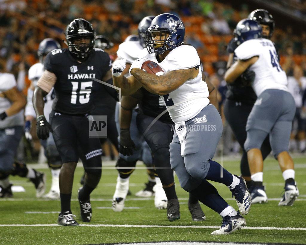 Marco Garcia Nevada running back Devonte Lee (2) makes a touchdown against Hawaii during the second quarter of an NCAA college football game Saturday, Oct. 20, 2018, in Honolulu. (AP Photo/Marco Garcia)
