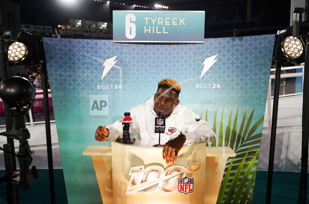 David J. Phillip Kansas City Chiefs' Tyreek Hill speaks to reporters during Opening Night for the NFL Super Bowl 54 football game Monday, Jan. 27, 2020, at Marlins Park in Miami. (AP Photo/David J. Phillip)