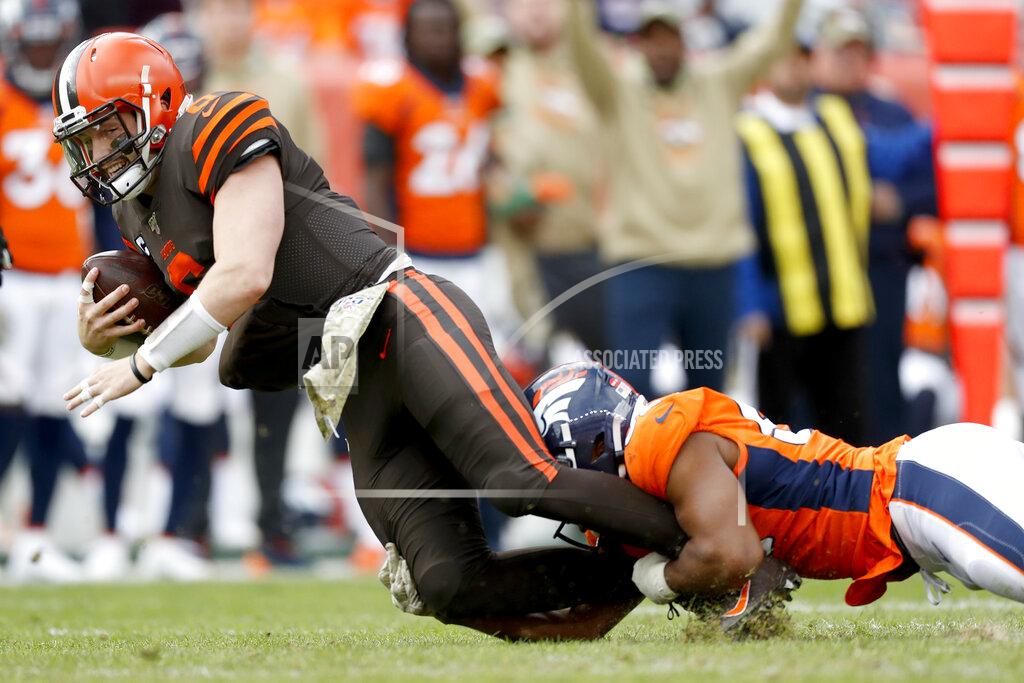 David Zalubowski Cleveland Browns quarterback Baker Mayfield (6) is sacked by Denver Broncos linebacker Justin Hollins during the first half of NFL football game, Sunday, Nov. 3, 2019, in Denver. (AP Photo/David Zalubowski)