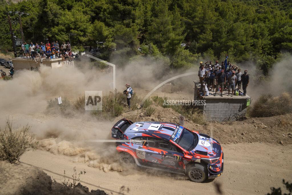 Petros Giannakouris Pierre Louis Loubet and his co driver Vincent Florian Haut Labourdette go France with their Hyundai i20 coupe WRC car compete in the WRC Acropolis Rally at the stage of Aghii Theodori, west of Athens, on Friday, Sept. 10, 2021. The World Rally Championship returned to Greece after an eight-year absence. (AP Photo/Petros Giannakouris)
